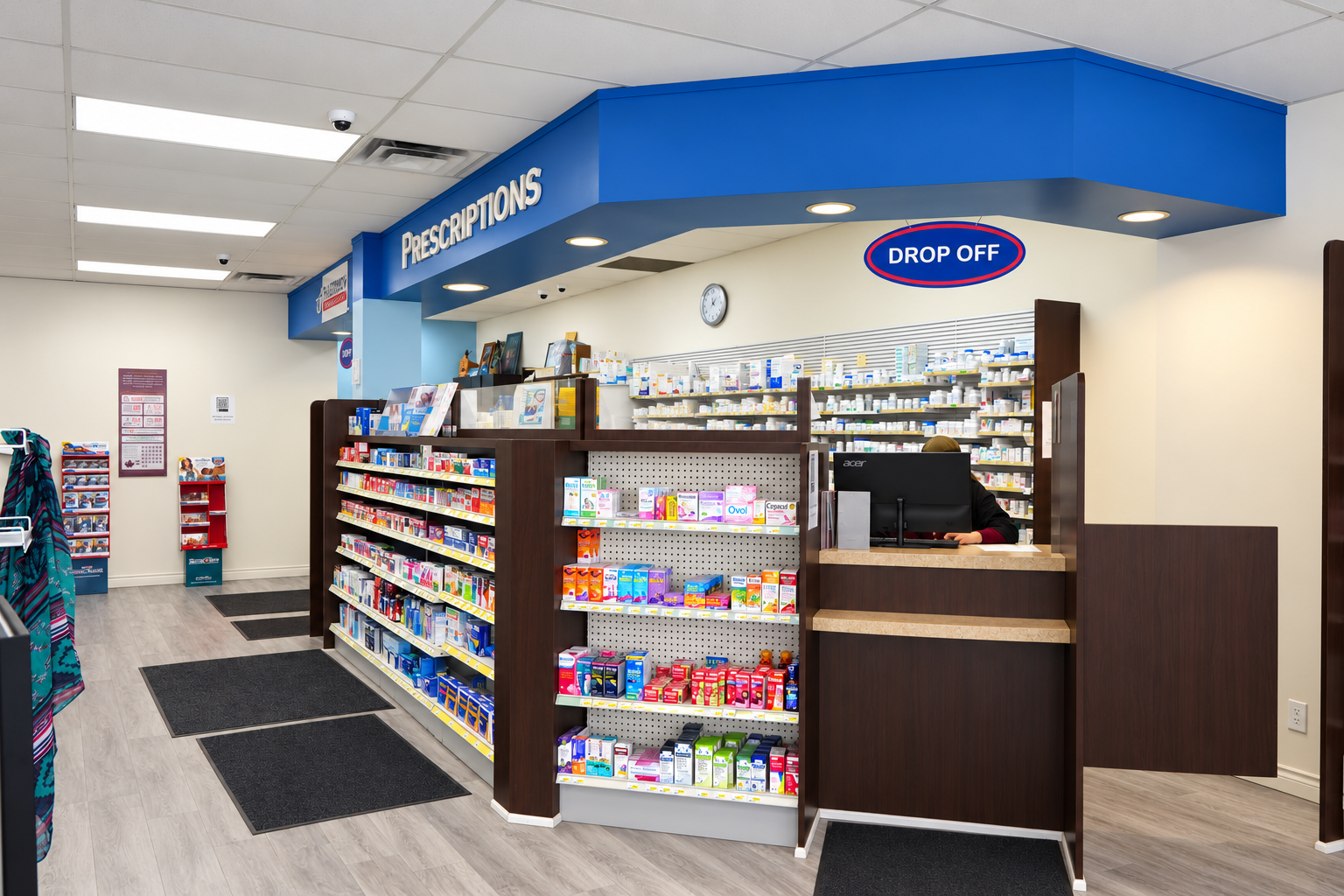 Prescription counter and stocked shelves inside Grove St Pharmacy